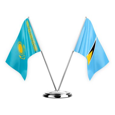 Two table flags isolated on white background 3d illustration, kazakhstan and saint lucia