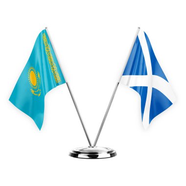 Two table flags isolated on white background 3d illustration, kazakhstan and scotland
