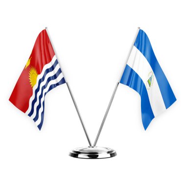 Two table flags isolated on white background 3d illustration, kiribati and nicaragua