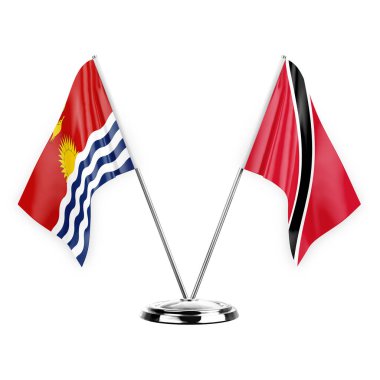 Beyaz arka planda izole edilmiş iki masa bayrakları. 3D illüstrasyon, kiribati ve tobago.