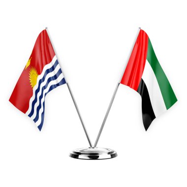 Beyaz arka planda izole edilmiş iki masa bayrakları. 3 boyutlu illüstrasyon, kiribati ve birleşik Arap Emirlikleri.
