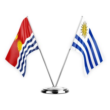 Beyaz arka planda izole edilmiş iki masa bayrağı. 3D illüstrasyon, kiribati ve uruguay.