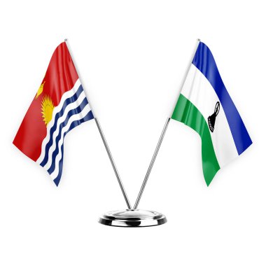 Beyaz arka planda izole edilmiş iki masa bayrakları. 3D illüstrasyon, kiribati ve lesotho.