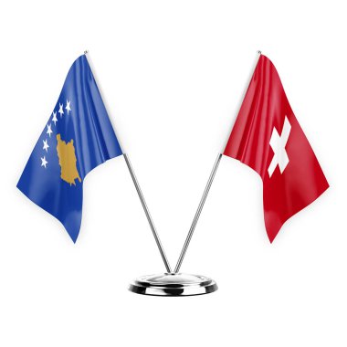 Beyaz arkaplanda iki masa bayrağı izole edildi. 3D illüstrasyon, Kosova ve İsviçre