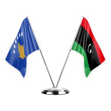 Beyaz arkaplanda izole edilmiş iki masa bayrakları 3D illüstrasyon, Kosova ve libya