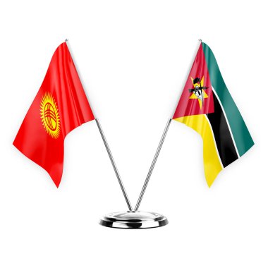 Two table flags isolated on white background 3d illustration, kyrgyzstan and mozambique