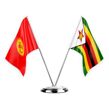 Two table flags isolated on white background 3d illustration, kyrgyzstan and zimbabwe