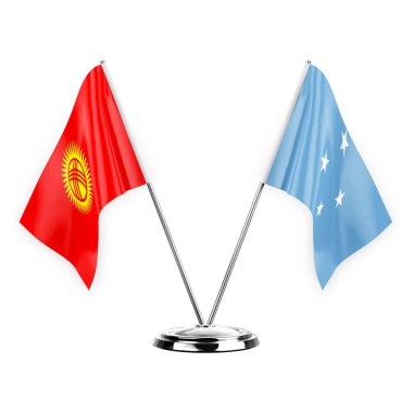 Two table flags isolated on white background 3d illustration, kyrgyzstan and micronesia
