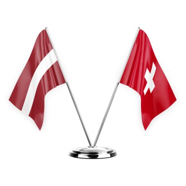 Two table flags isolated on white background 3d illustration, latvia and switzerland