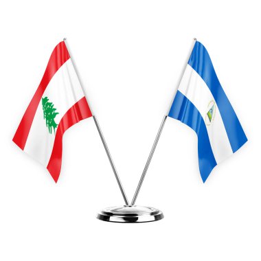Two table flags isolated on white background 3d illustration, lebanon and nicaragua