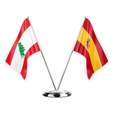 Two table flags isolated on white background 3d illustration, lebanon and spain