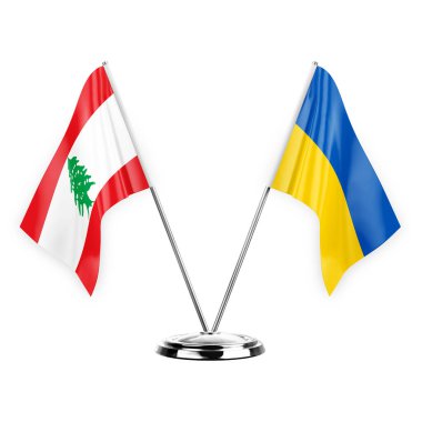 Two table flags isolated on white background 3d illustration, lebanon and ukraine