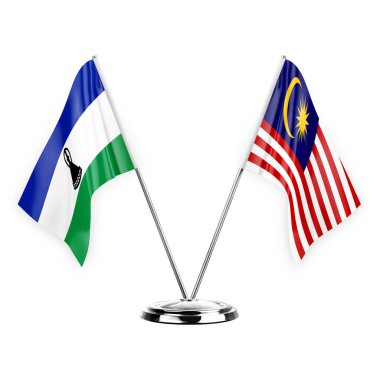 Two table flags isolated on white background 3d illustration, lesotho and malaysia