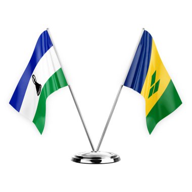 Two table flags isolated on white background 3d illustration, lesotho and saint vincent and the grenadines