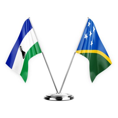 Two table flags isolated on white background 3d illustration, lesotho and solomon islands