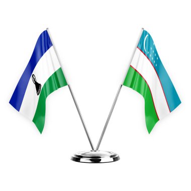 Two table flags isolated on white background 3d illustration, lesotho and uzbekistan