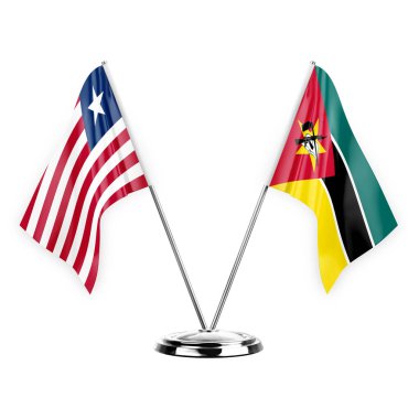 Two table flags isolated on white background 3d illustration, liberia and mozambique