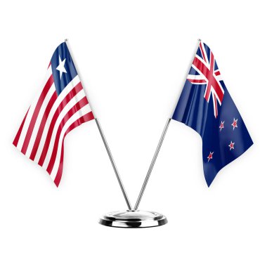 Two table flags isolated on white background 3d illustration, liberia and new zealand