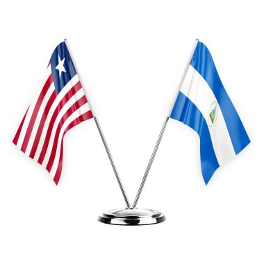 Two table flags isolated on white background 3d illustration, liberia and nicaragua