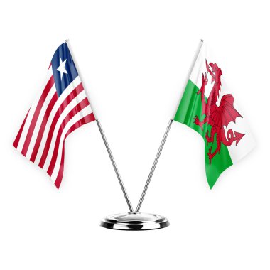 Two table flags isolated on white background 3d illustration, liberia and wales