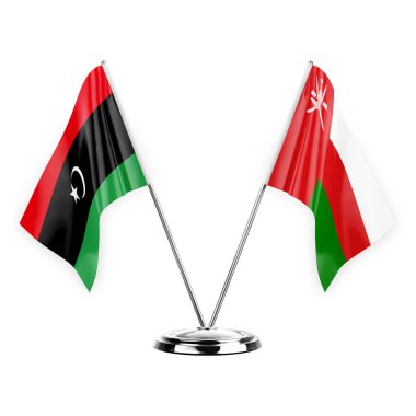 Two table flags isolated on white background 3d illustration, libya and oman