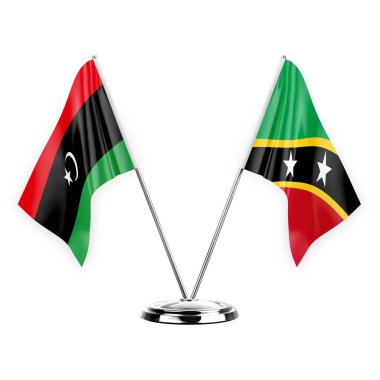 Two table flags isolated on white background 3d illustration, libya and saint kitts and venis