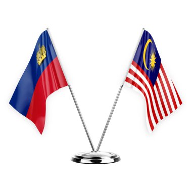 Two table flags isolated on white background 3d illustration, liechtenstein and malaysia