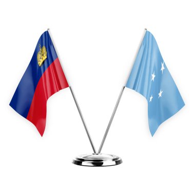 Two table flags isolated on white background 3d illustration, liechtenstein and micronesia