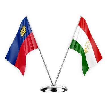 Two table flags isolated on white background 3d illustration, liechtenstein and tajikistan