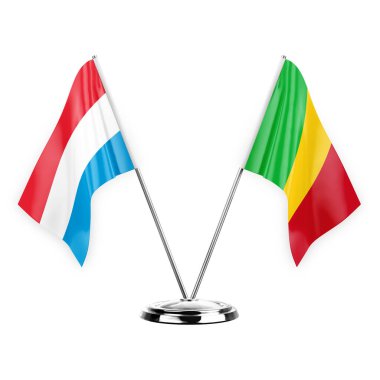 Two table flags isolated on white background 3d illustration, luxembourg and mali