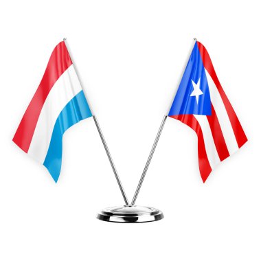 Two table flags isolated on white background 3d illustration, luxembourg and puerto rico