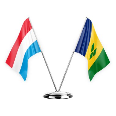 Two table flags isolated on white background 3d illustration, luxembourg and saint vincent and the grenadines