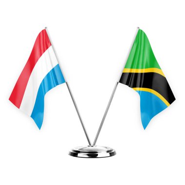 Two table flags isolated on white background 3d illustration, luxembourg and tanzania