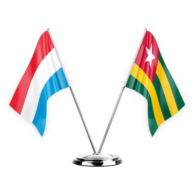 Two table flags isolated on white background 3d illustration, luxembourg and togo