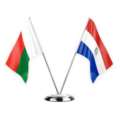 Two table flags isolated on white background 3d illustration, madagascar and paraguay