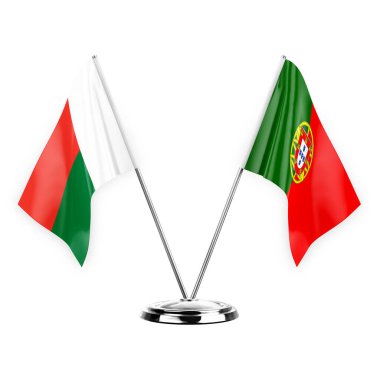 Two table flags isolated on white background 3d illustration, madagascar and portugal