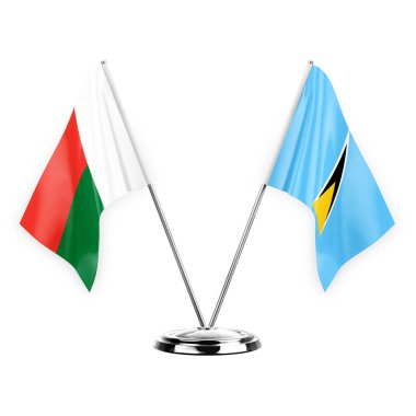 Two table flags isolated on white background 3d illustration, madagascar and saint lucia