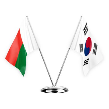 Two table flags isolated on white background 3d illustration, madagascar and south korea
