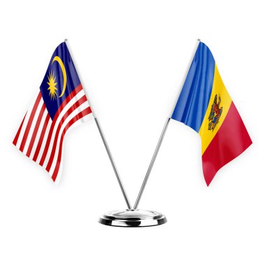 Two table flags isolated on white background 3d illustration, malaysia and moldova
