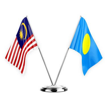 Two table flags isolated on white background 3d illustration, malaysia and palau