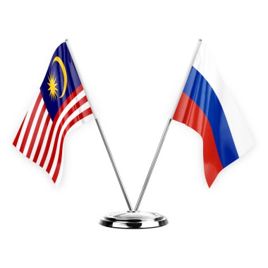 Two table flags isolated on white background 3d illustration, malaysia and russia