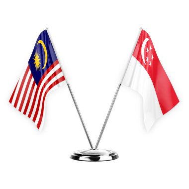 Two table flags isolated on white background 3d illustration, malaysia and singapore