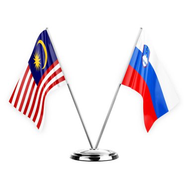 Two table flags isolated on white background 3d illustration, malaysia and slovenia
