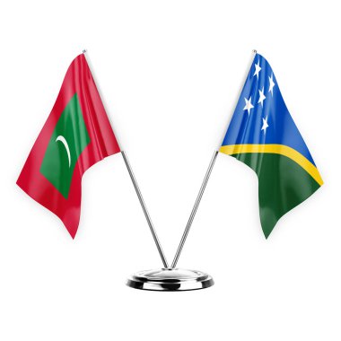 Two table flags isolated on white background 3d illustration, maldives and solomon islands