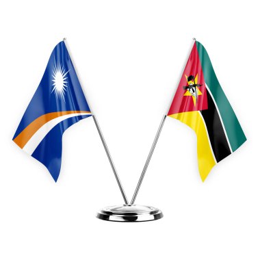 Two table flags isolated on white background 3d illustration, marshall islands and mozambique