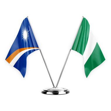 Two table flags isolated on white background 3d illustration, marshall islands and nigeria