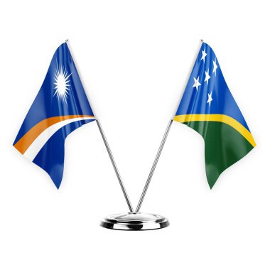 Two table flags isolated on white background 3d illustration, marshall islands and solomon islands