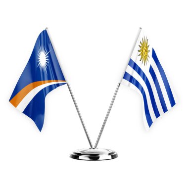 Two table flags isolated on white background 3d illustration, marshall islands and uruguay