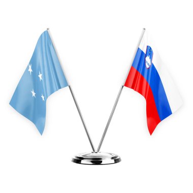 Two table flags isolated on white background 3d illustration, micronesia and slovenia