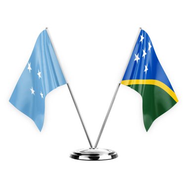 Two table flags isolated on white background 3d illustration, micronesia and solomon islands